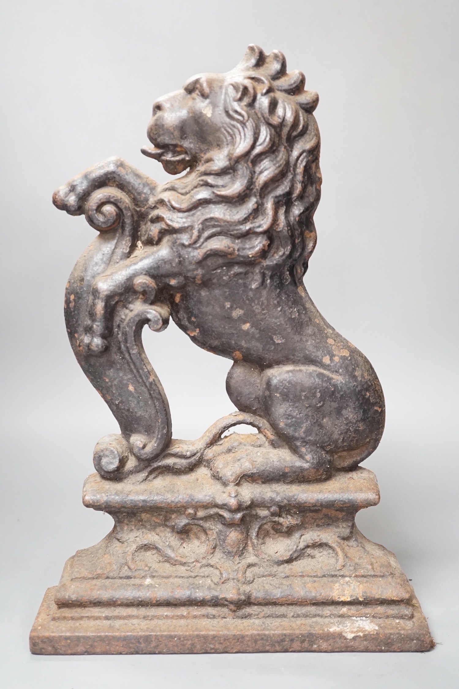 A Victorian cast iron rearing lion door stop, 38.5cm